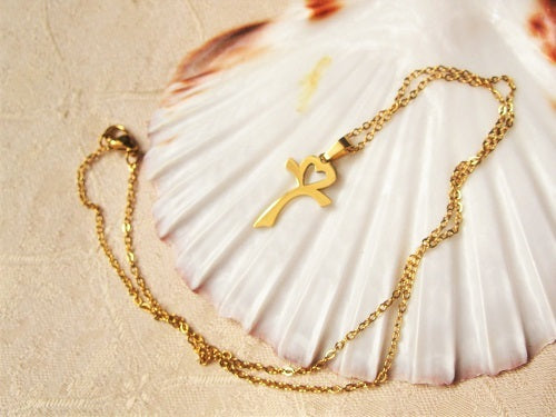 Cross necklace for spiritual healing and wellbeing
