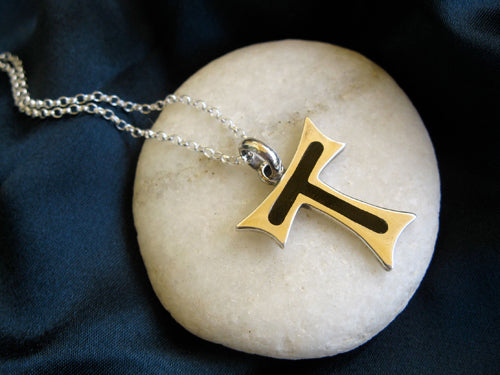 Tau Cross necklace for someone with the travel bug