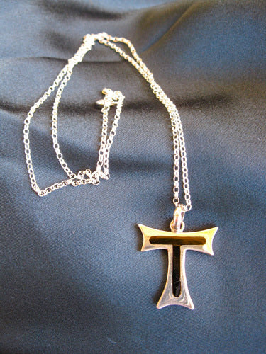 Tau Cross necklace for someone with the travel bug