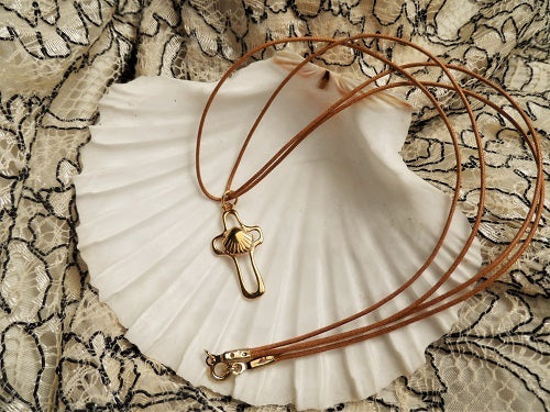 Gold scallop shell cross necklace